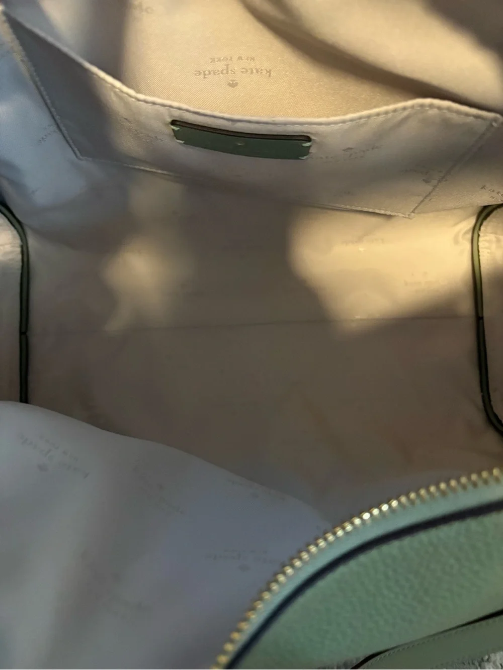 kate spade sage green leather shoulder bag with knot strap detail